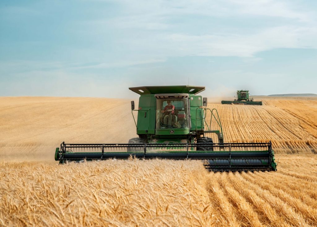 John Deere's combine harvester harvesting wheat