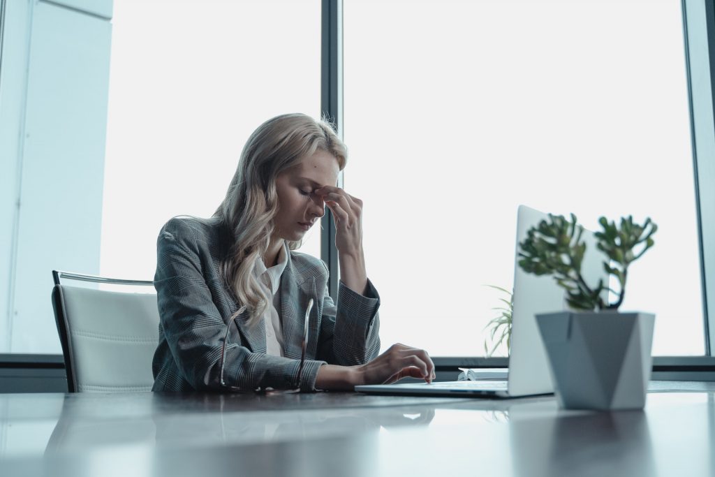 Woman stressed with legacy software integration