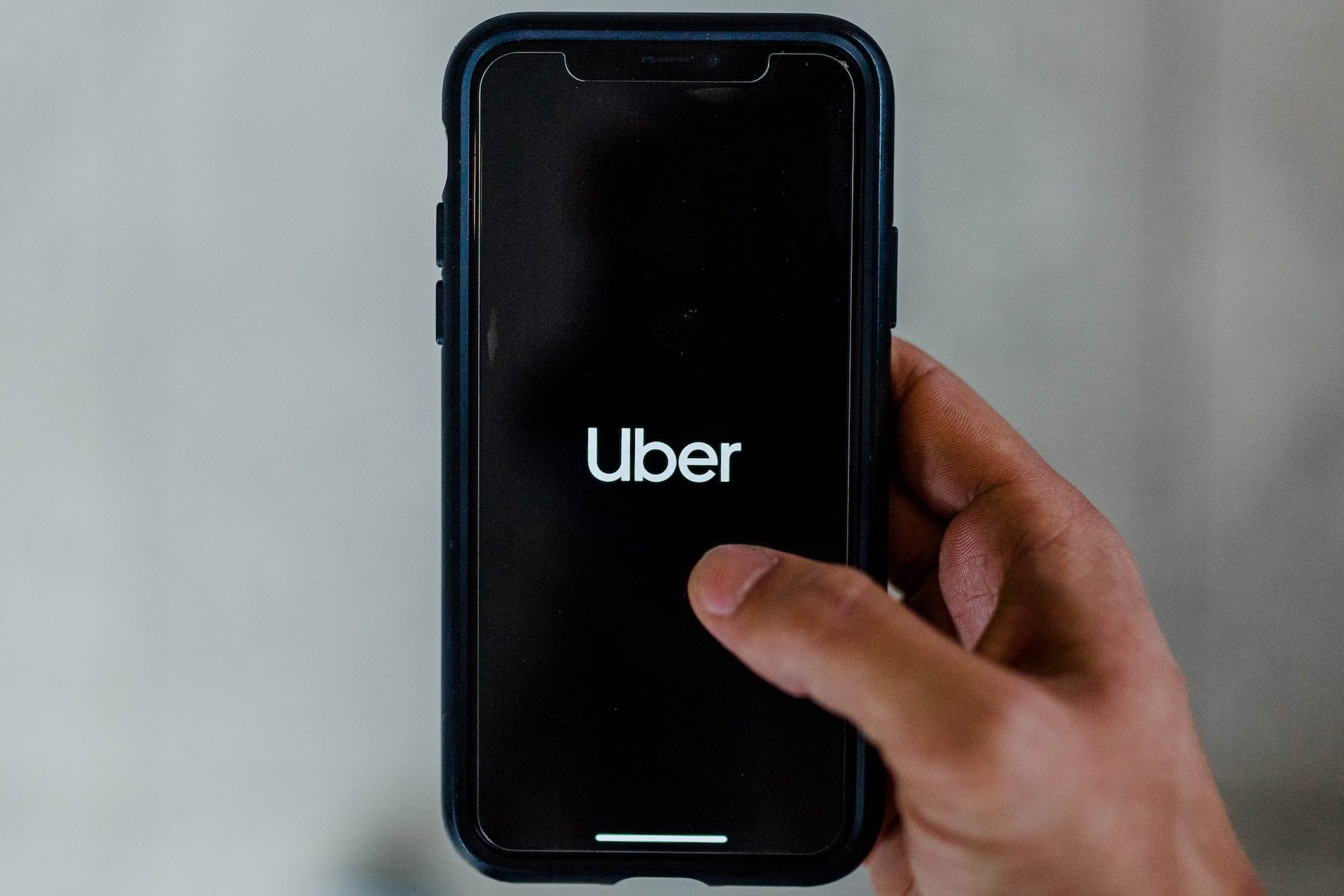Uber logo on smartphone