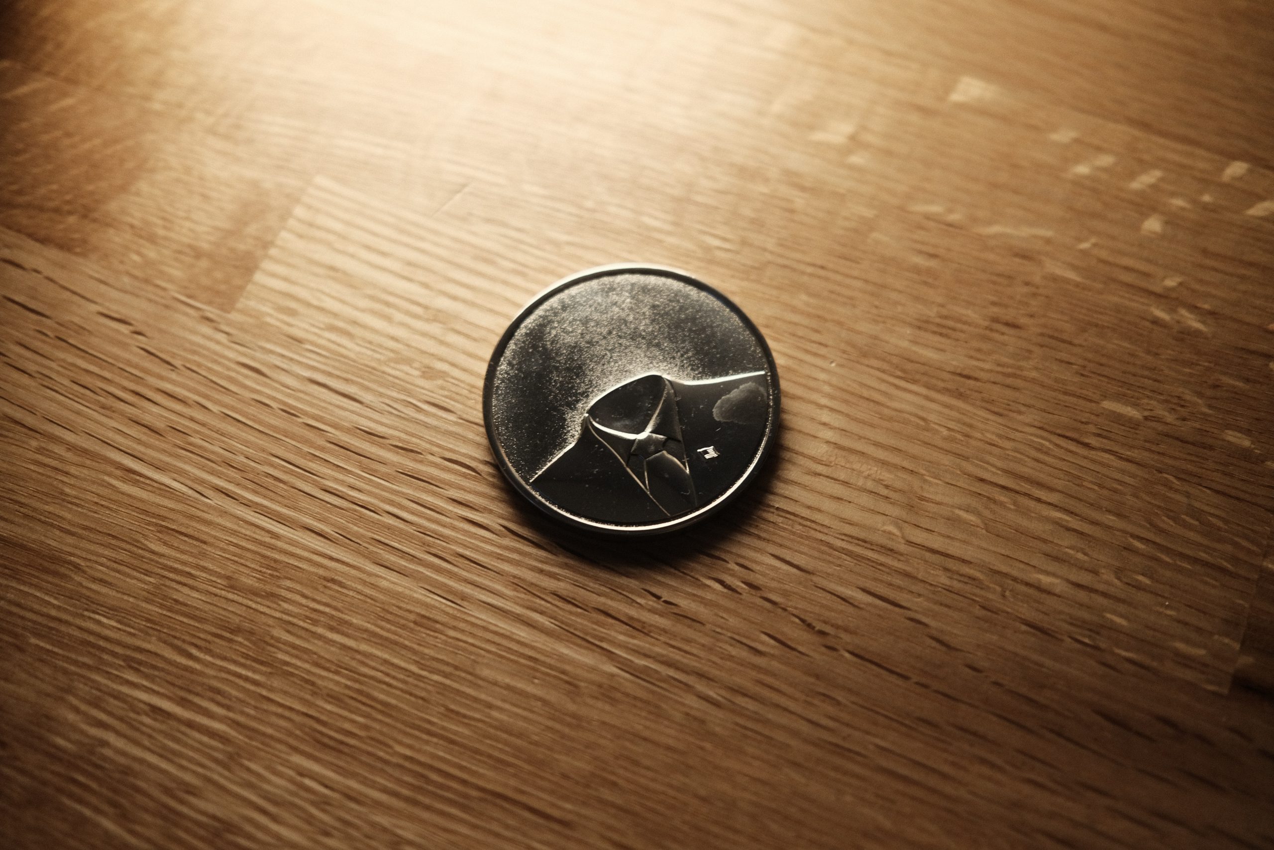 Coin showing person without a head