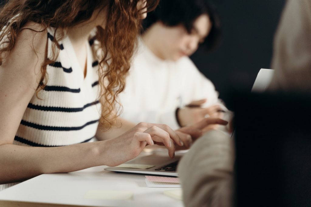 Woman typing what is scrum methodology